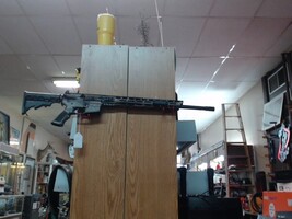 Anderson Mfg AM-15. 5.56/.223 AR-15 Rifle. Camo Finish. One Mag.