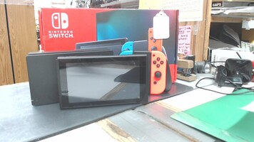 Nintendo Switch w/ Charging Dock and Red & Blue Joy Cons