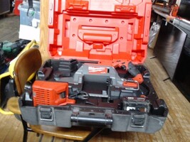 Milwaukee M198 Band Saw w/battery and charger. Like NEW in case.