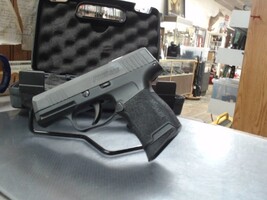 Sig Sauer P365SAS. As new in box with 2 mags. Anti-Snag CC Pistol.