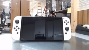 Nintendo Switch w/ White Joy Cons