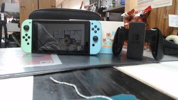 Nintendo Switch w/ Charging Dock ,Case and Joy Con Holder